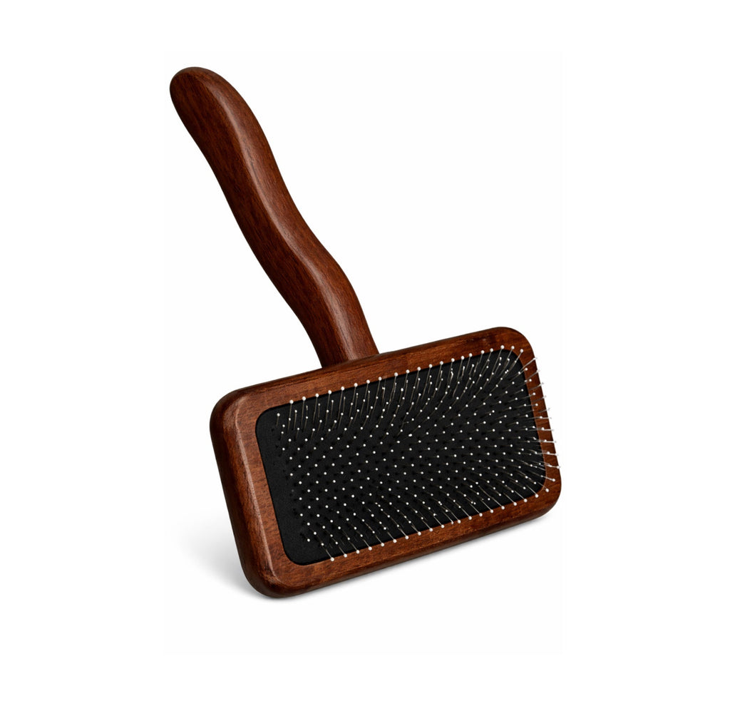Martina Waterman slicker dog brush angled view showing ergonomic design